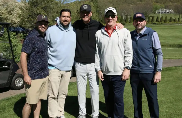 Chad and a group of men at a sponsored golf outing for Knoebels' 100th anniversary